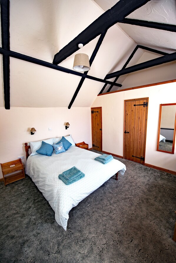 Desk, laptop workspace, iron/ironing board, rollaway beds