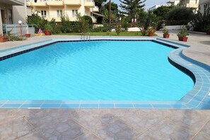 Outdoor pool, pool umbrellas, pool loungers