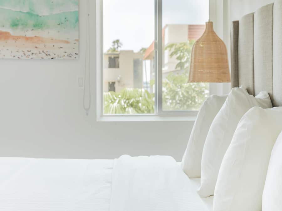 Premium bedding, pillowtop beds, desk, blackout drapes