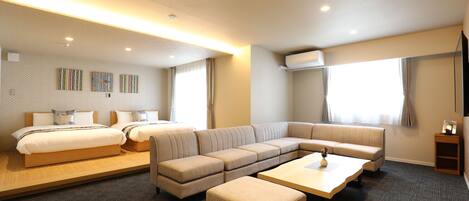 Chambre Exécutive, non-fumeurs (B) | Coin séjour | Télévision à écran plat