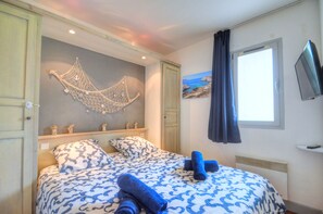 1 chambre, coffres-forts dans les chambres, fer et planche à repasser