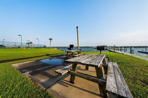 Outdoor dining - Coastal Getaway w/ Gulf & Lagoon Views | 2 Balconies | Boat-Friendly | Pool (Gulf Shores)