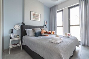 1 habitación, tabla de planchar con plancha, cuna de viaje y wifi 
