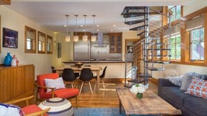 A modern living room with a dining area, a staircase, and a kitchen. - AUGUST SPECIAL! Luxury home-Heart of Telluride 3B+loft; deck/VIEWS/gas fireplace (Telluride)