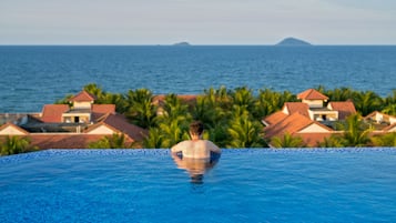 Outdoor pool, pool umbrellas, pool loungers