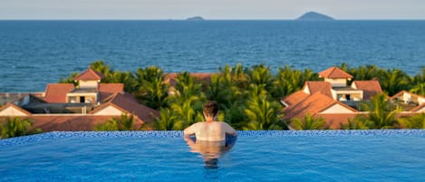 Outdoor pool, pool umbrellas, pool loungers