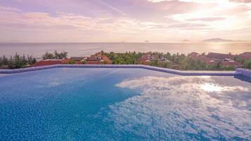 Outdoor pool, pool umbrellas, pool loungers