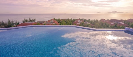 Outdoor pool, pool umbrellas, pool loungers