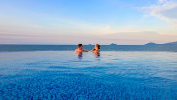 Outdoor pool, pool umbrellas, pool loungers