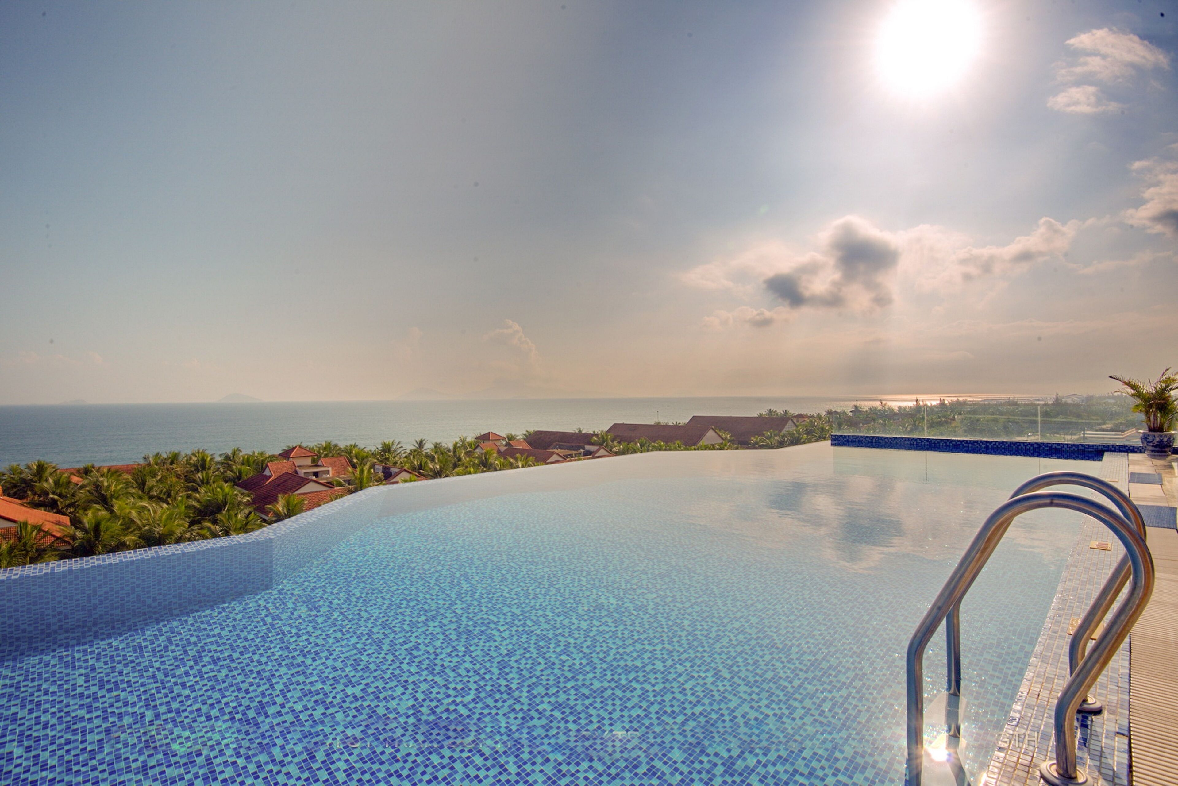 outdoor pool, pool umbrellas, pool loungers