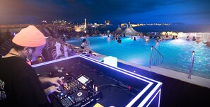 Seasonal outdoor pool, open 3:00 PM to 10:00 PM, pool loungers