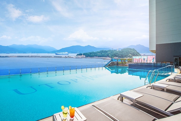 Seasonal outdoor pool, open 3:00 PM to 10:00 PM, pool loungers
