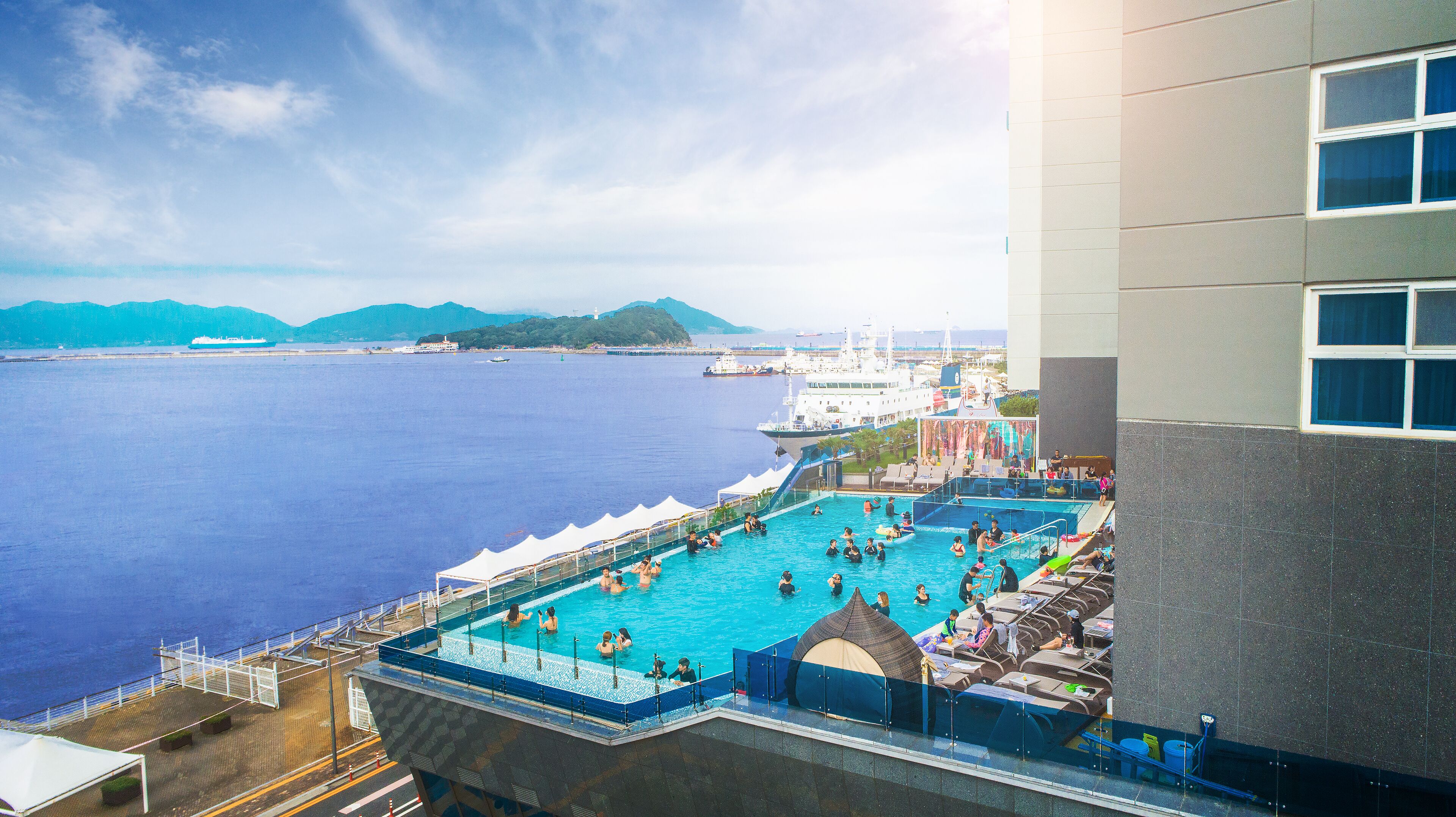 seasonal outdoor pool, open 3:00 pm to 10:00 pm, pool loungers