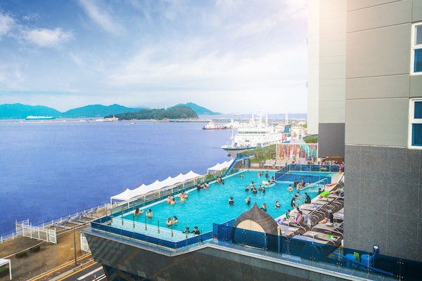 Seasonal outdoor pool, open 3:00 PM to 10:00 PM, sun loungers