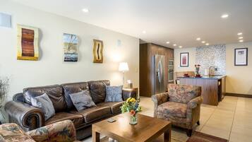 Condo, 2 Bedrooms | Living area | Flat-screen TV