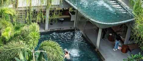 2 outdoor pools, open 6:00 AM to 10:00 PM, pool umbrellas, pool loungers