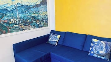 Apartamento panorâmico, 2 quartos, vista para o mar | Área de estar | Smart TV, Netflix