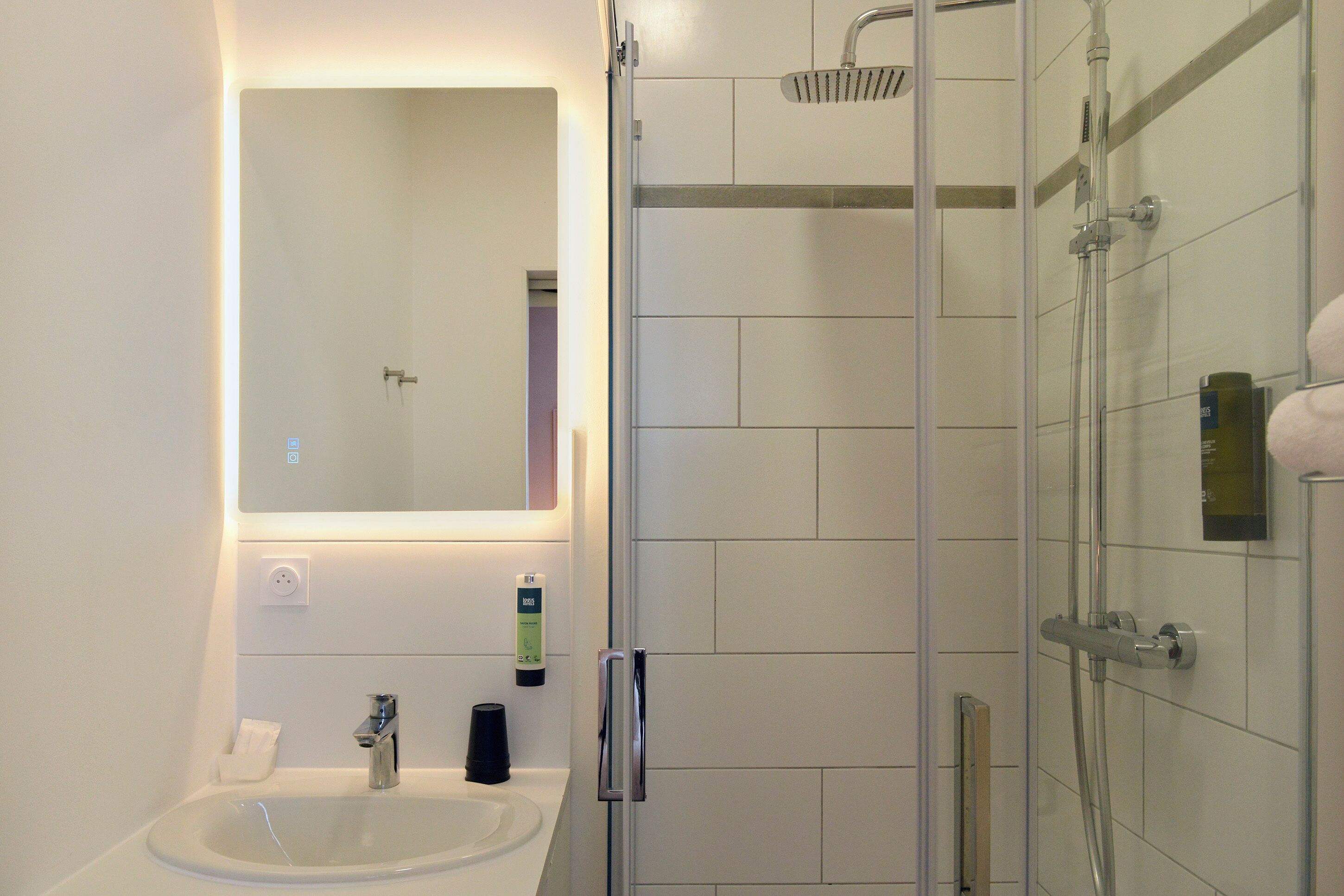 eco-friendly toiletries, hair dryer, towels, soap