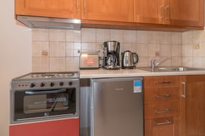 Frigorifero, piano cottura, macchina per tè/caffè, bollitore elettrico