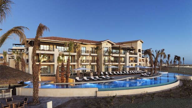 A resort with a pool, multiple balconies, and palm trees. - Grand Solmar at Rancho San Lucas (Cabo San Lucas, Baja California Sur)