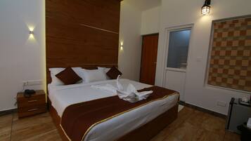 Deluxe Suite | 1 bedroom, premium bedding, in-room safe, blackout curtains