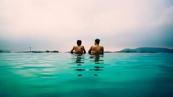 Outdoor pool, open 7:30 AM to 7:00 PM, pool loungers