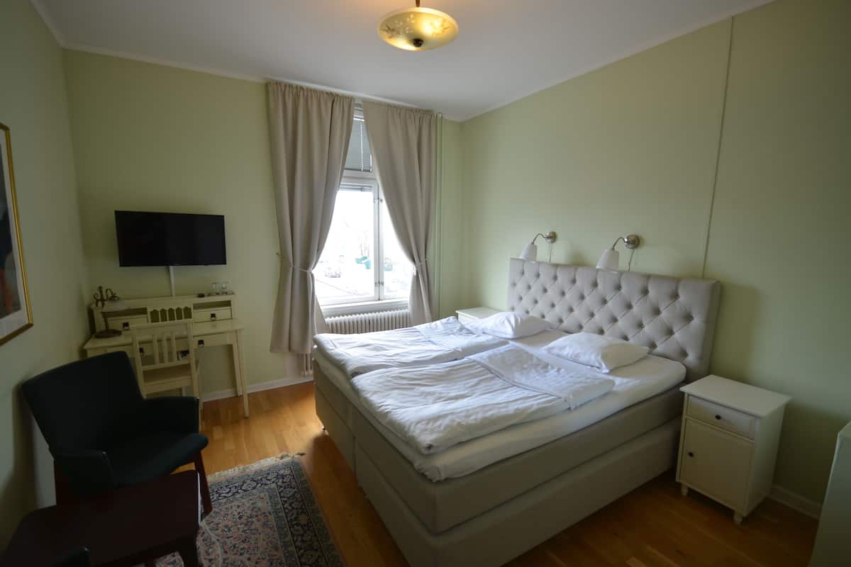 Classic Double Room | Desk, laptop workspace, blackout drapes, iron/ironing board (on request)