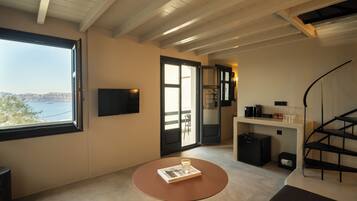 Split Level Junior Suite with Caldera View | Premium bedding, minibar, in-room safe, individually decorated