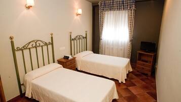 Desk, bed sheets, wheelchair access