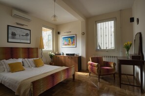 Apartment (Orange) | Premium bedding, memory-foam beds, individually decorated