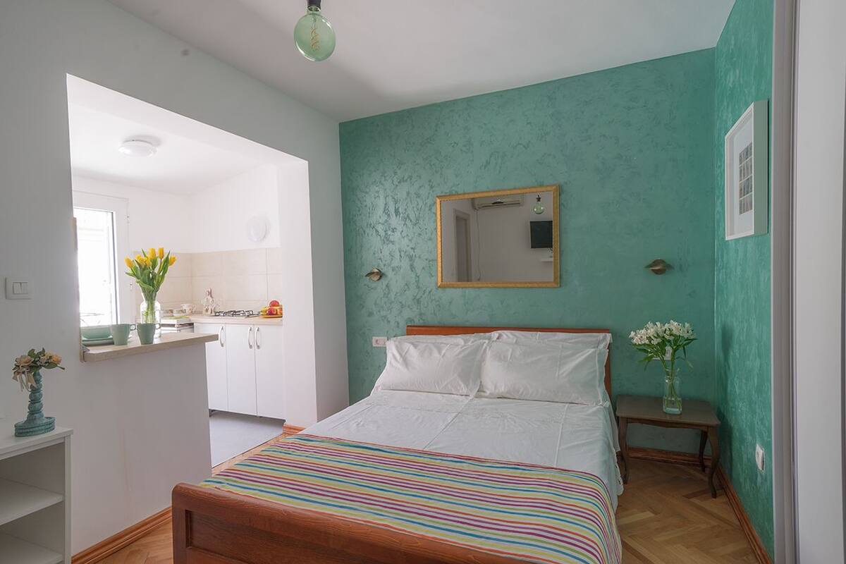 Premium bedding, memory-foam beds, desk, laptop workspace