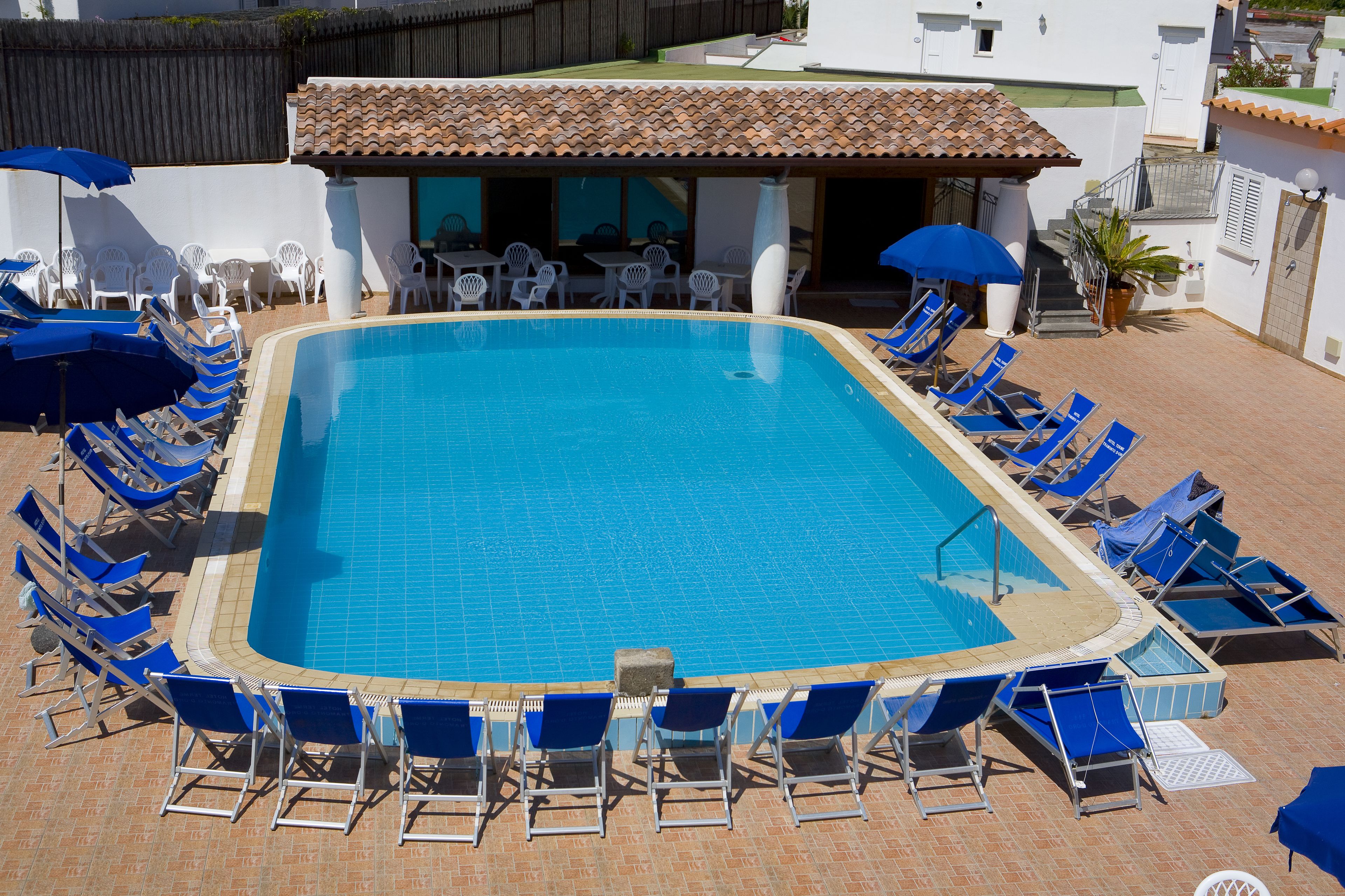 2 indoor pools, outdoor pool, open 7:00 AM to 7:30 PM, pool umbrellas