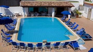 2 indoor pools, outdoor pool, open 7:00 AM to 7:30 PM, pool umbrellas