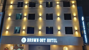 A multi-story hotel with illuminated signage reading "BROWN-DOT HOTEL" and a logo above the entrance. - Browndot Hotel Gwangju Hanam Branch (Gwangju)