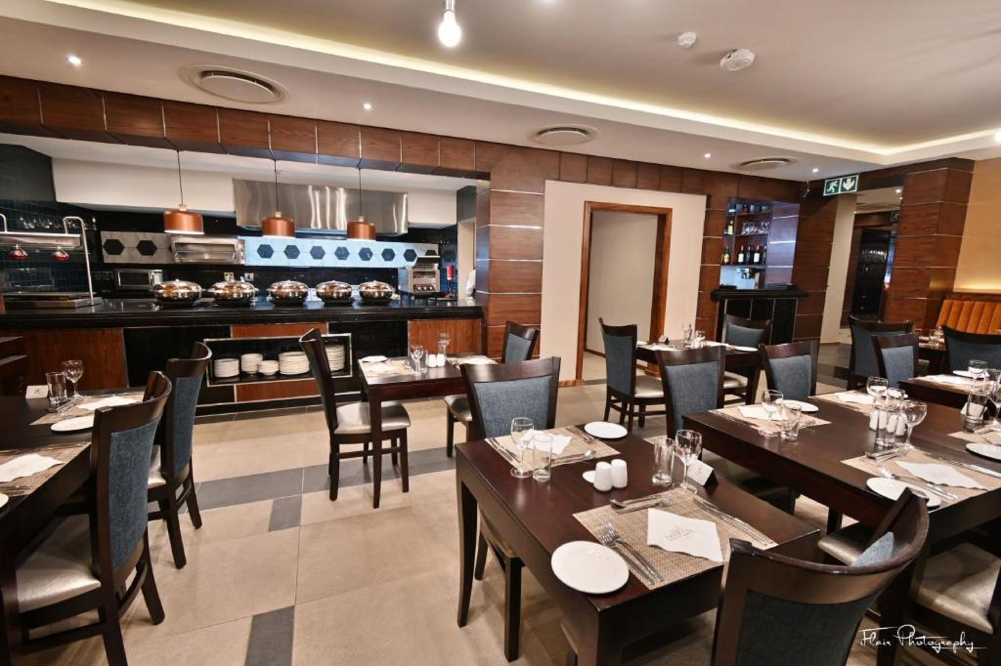 Breakfast, lunch, dinner served; local and international cuisine 