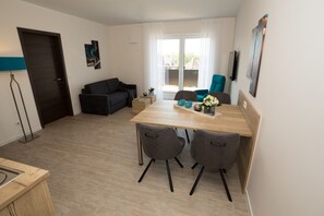 Cobertura luxo, vista para o jardim | Área de estar | Smart TV