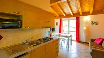 Fridge, oven, dishwasher, dining tables