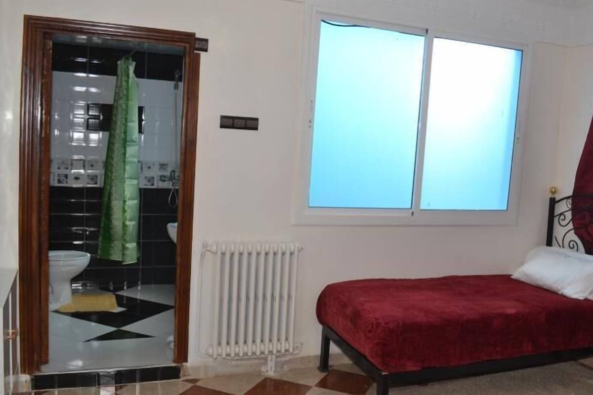 Desk, blackout curtains, free WiFi, bed sheets