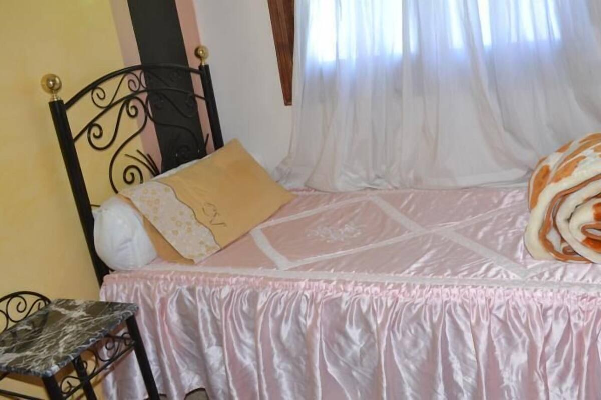 Desk, blackout curtains, free WiFi, bed sheets
