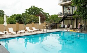 Seasonal outdoor pool, pool umbrellas, pool loungers
