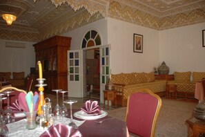 Breakfast, lunch, dinner served; local cuisine 