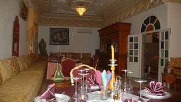 Breakfast, lunch, dinner served; local cuisine