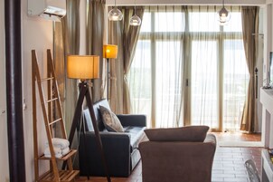 Double Room | Living room | Flat-screen TV