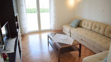 Classic Apartment | Living area | Flat-screen TV