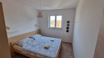 Apartment, Meerblick | 1 Schlafzimmer, schallisolierte Zimmer, kostenloses WLAN, Bettwäsche