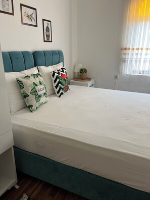 Suíte júnior | Ferros/tábuas de passar roupa, Wi-Fi de cortesia, roupa de cama