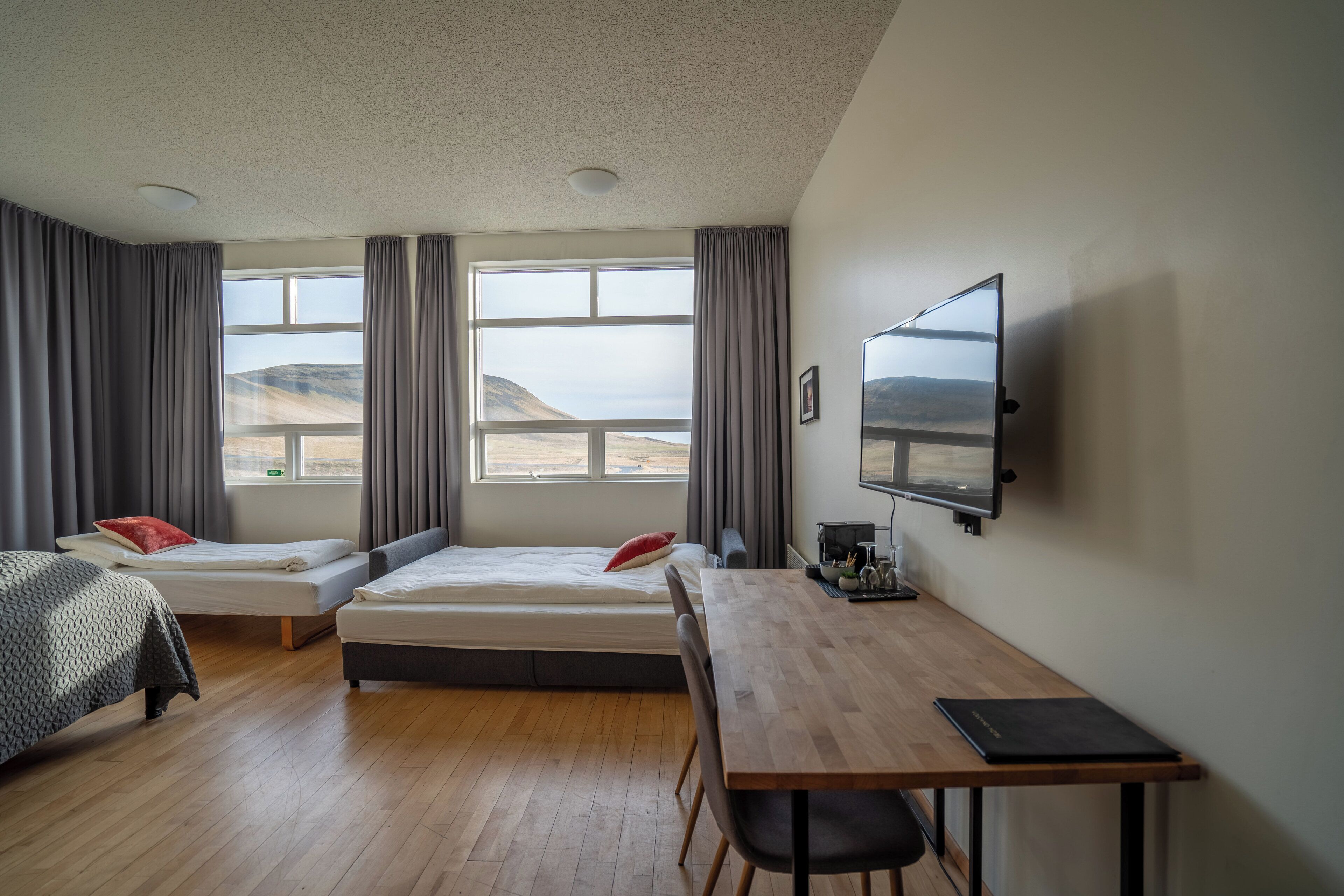 superior double room, 1 king bed with sofa bed, private bathroom, ocean view | 1 bedroom, individually furnished, desk, laptop workspace