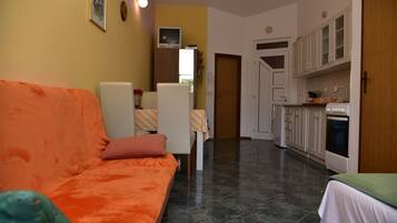 Apartment, 1 Bedroom (A4) | Living room | TV