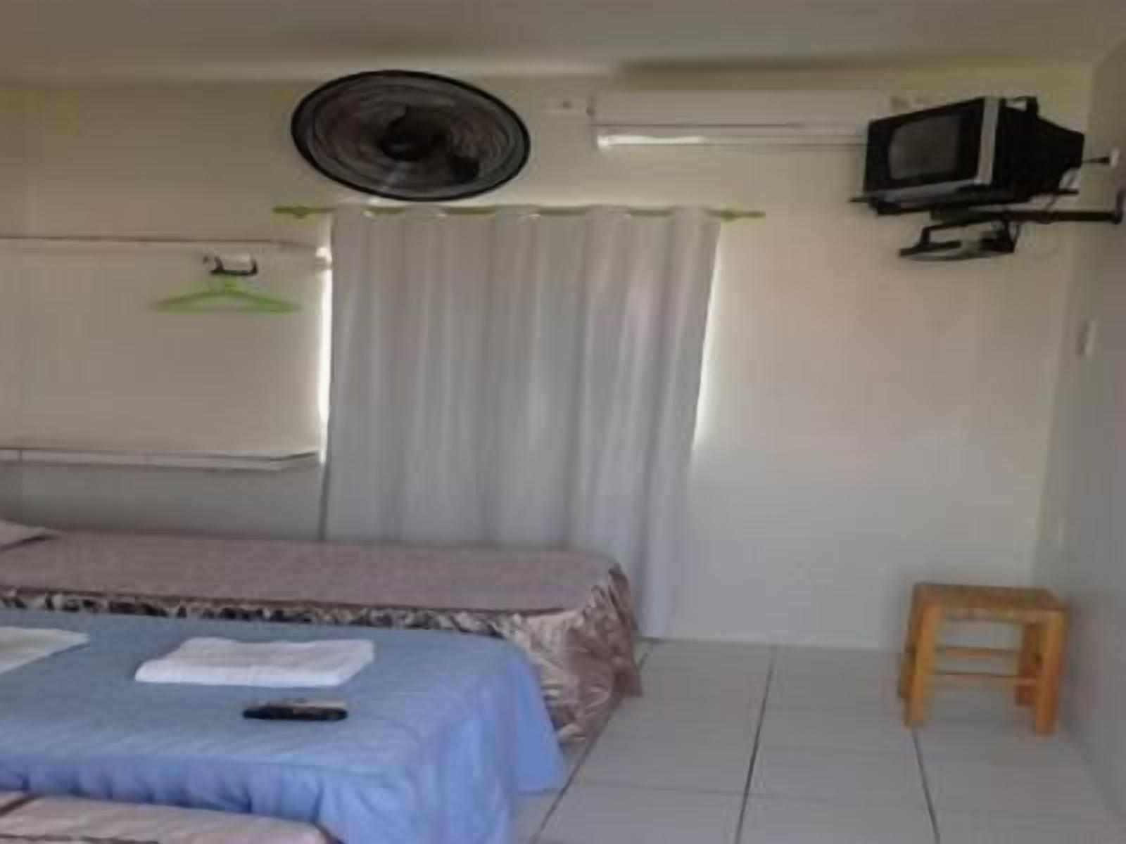Quarto Casal Suite | Frigobar, cortinas blackout, Wi-Fi de cortesia, roupa de cama