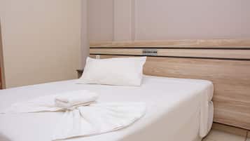 Quarto solteiro | Frigobar, Wi-Fi de cortesia